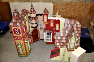 Custom indoor village playhouse for a waiting room.