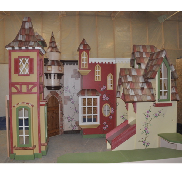 Reilly Dental custom hand painted indoor village playhouse with slide and stairs